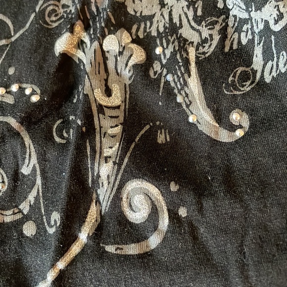 Black shirt. With straps that criss cross in the back. Sz small - Picture 2 of 7